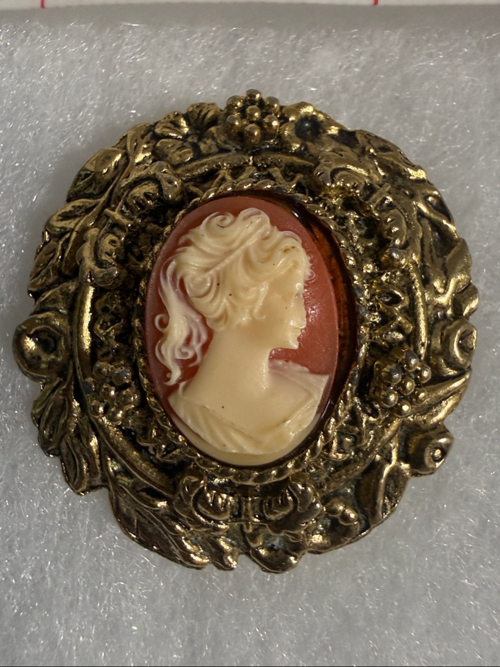Gold-Tone Cameo Brooch with Cream and Coral Relief